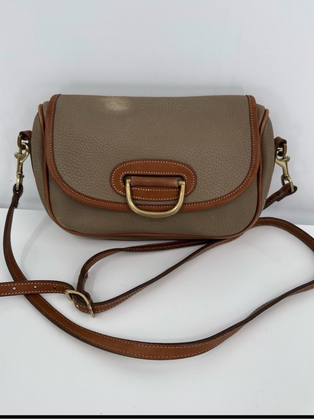 Taupe vintage Dooney and Brown Leather Crossbody Bag with Brass Hardware